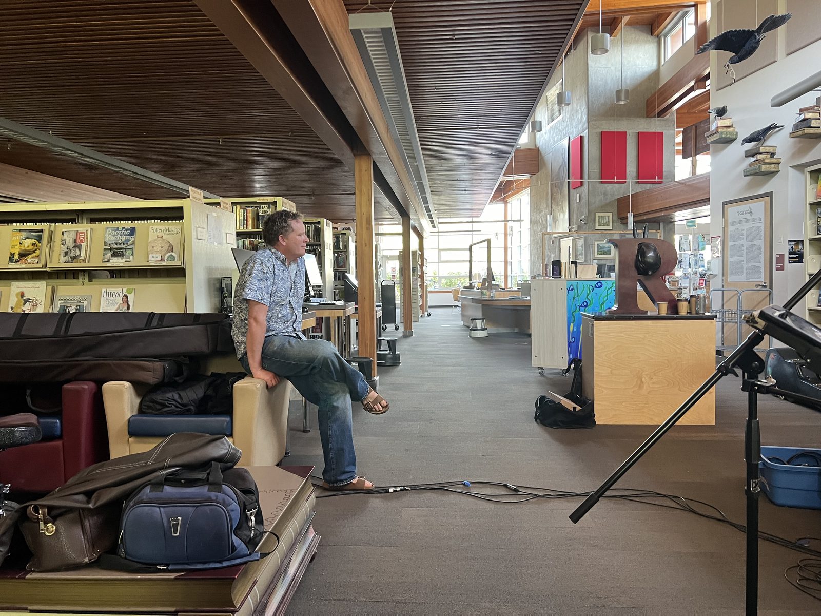 Felix Fung behind a rack of recording gear and cables