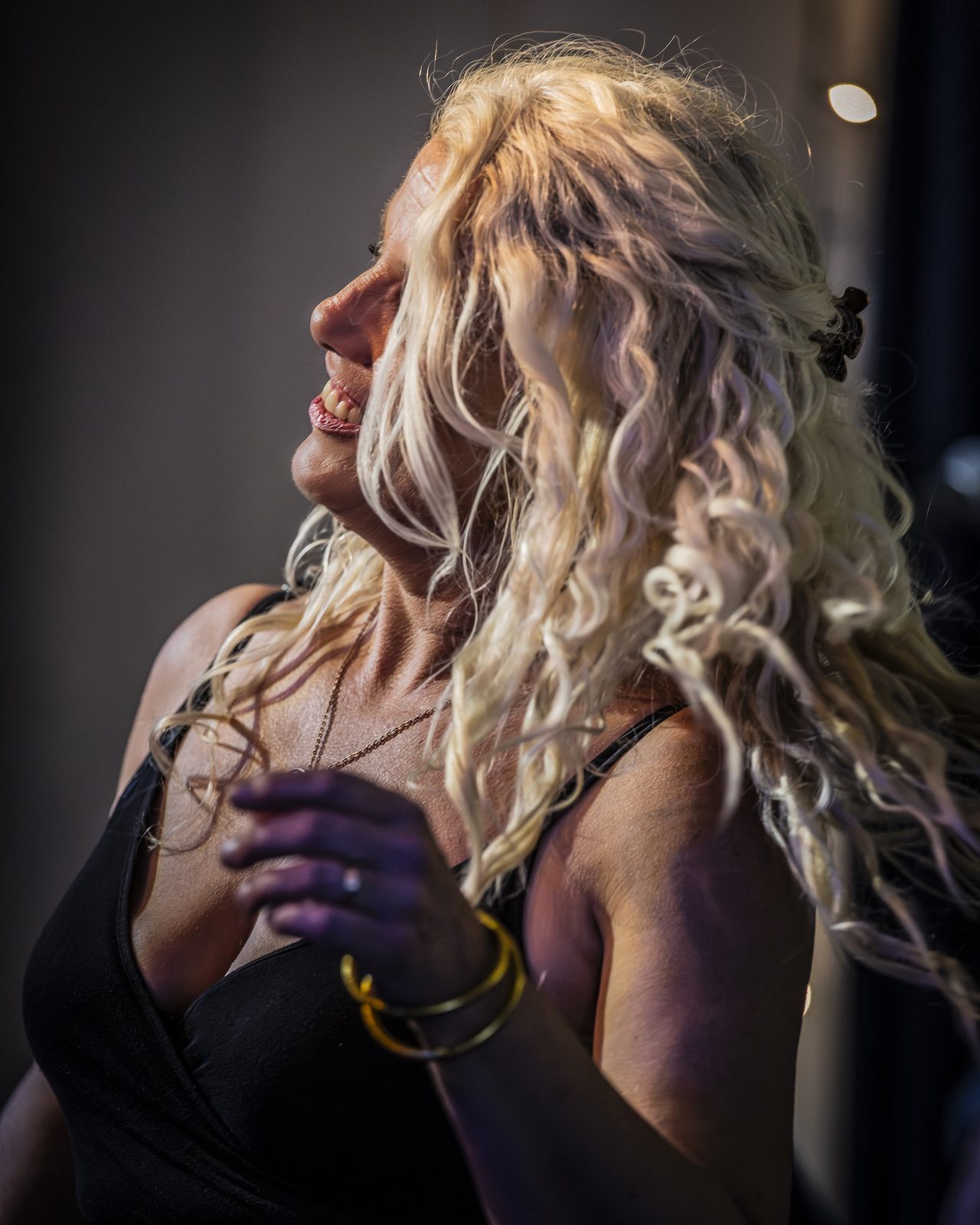 Sarah Dawn Morris laughing in profile