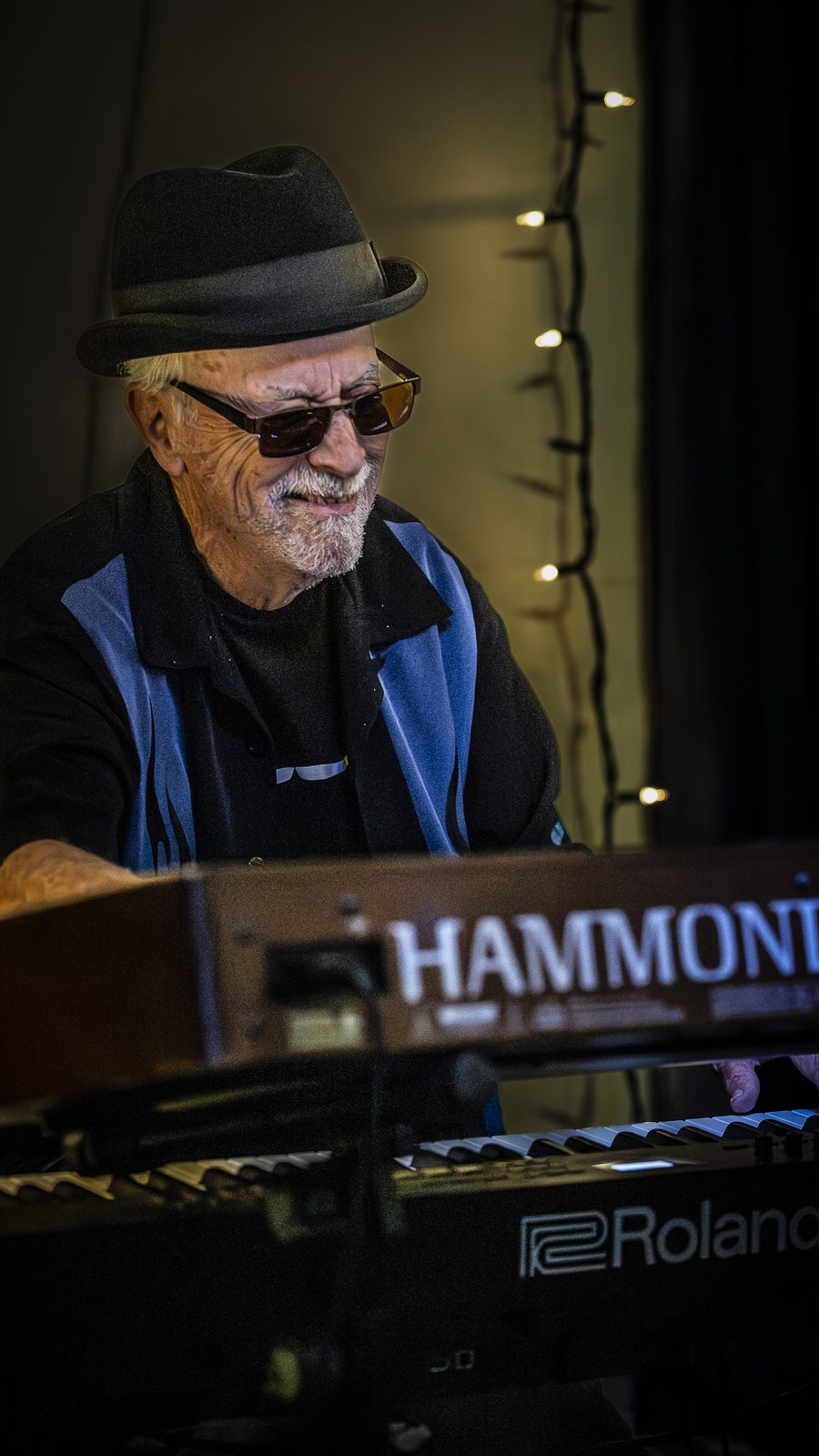 Wilf Davies smiling at his Hammond organ